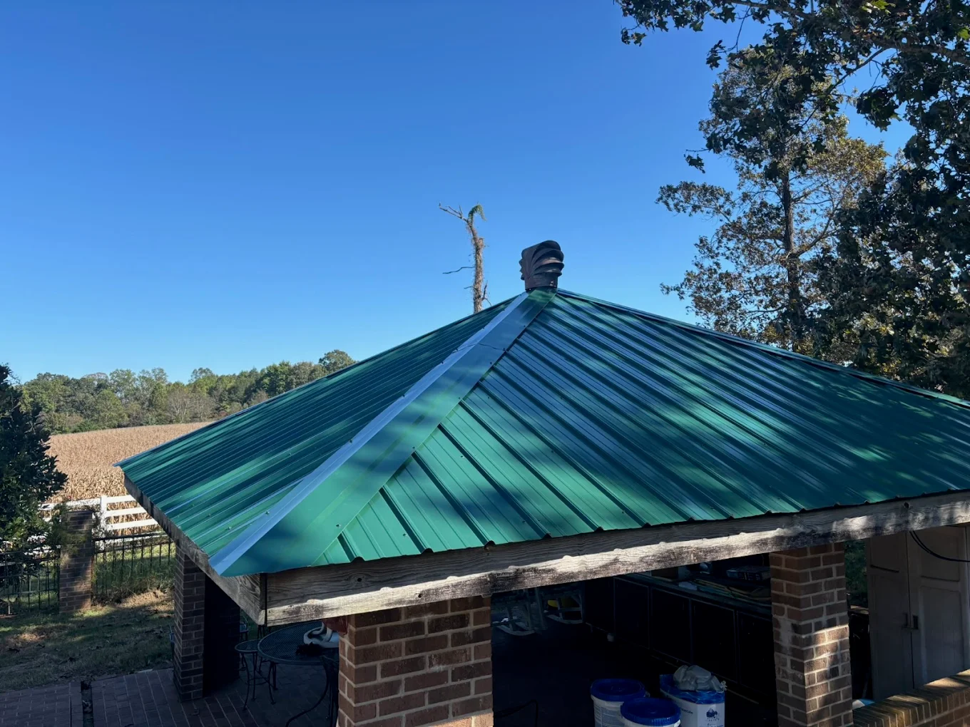 New green metal roof installation
